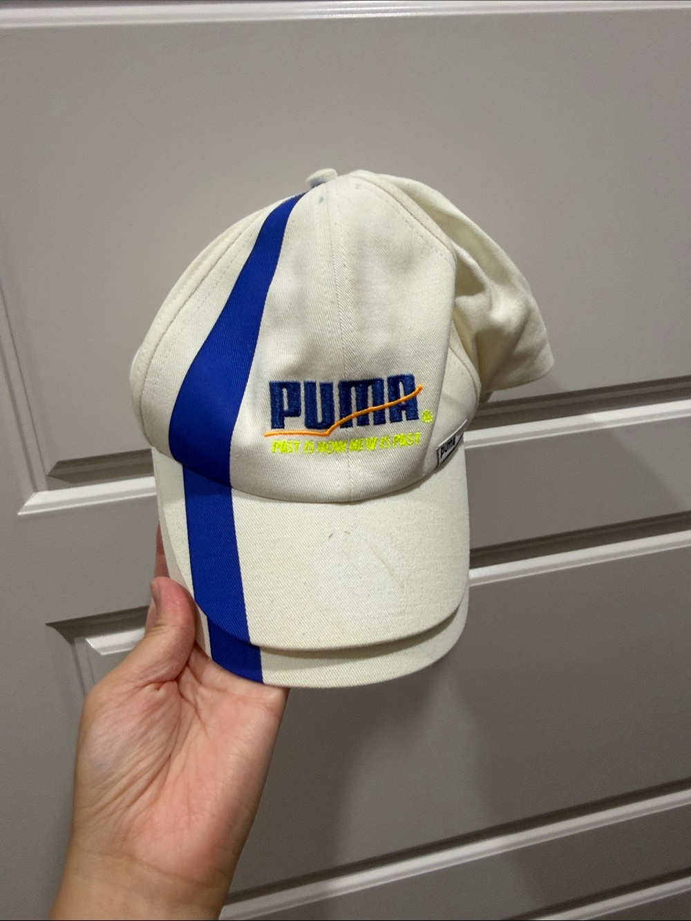 Puma Cream Cap with Bold Blue Stripe